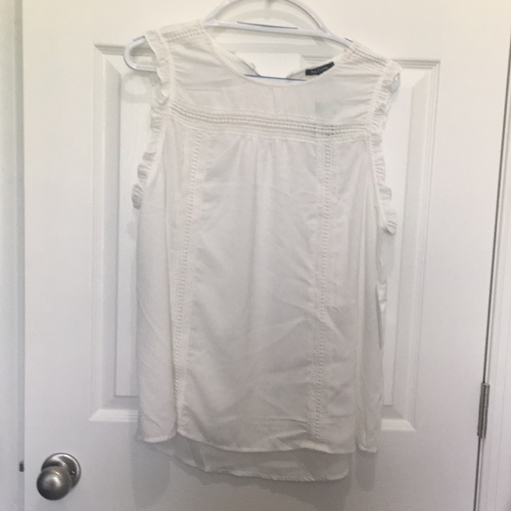 White sleeveless blouse